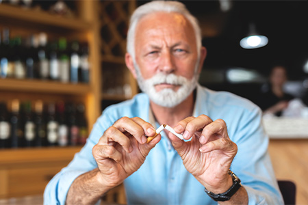 Quitting smoking can help protect your dental implants from failure