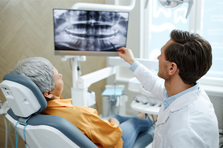 The Woodlands patient discussing root canal options.