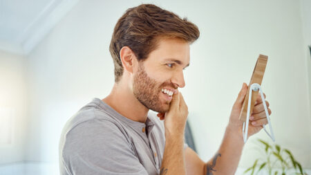 Patient smiling after cosmetic dentistry.
